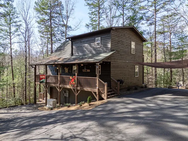 an outdoor view of a house with balcony
