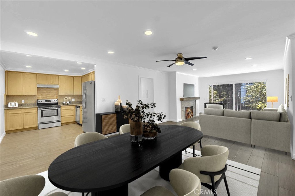 200 McNeil Lane, Unit 204 Newport Beach, CA 92663 - Photo 2 of 28 a living room with furniture kitchen and a table