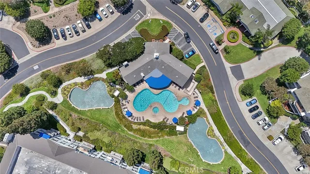 aerial view of a swimming pool with outdoor space