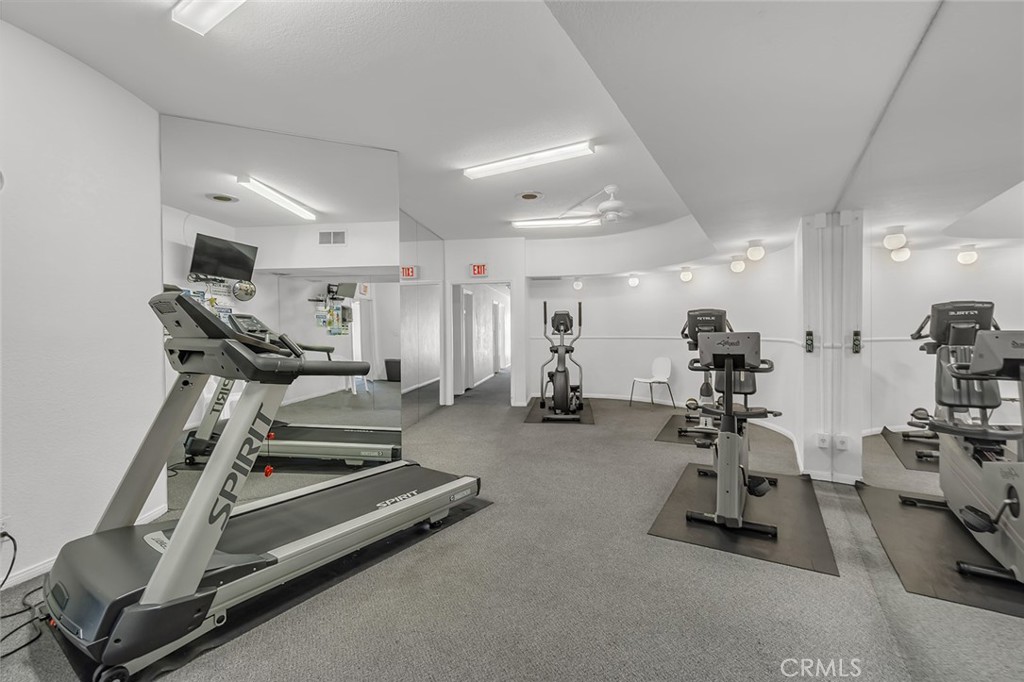 200 McNeil Lane, Unit 204 Newport Beach, CA 92663 - Photo 22 of 28 a view of a room with gym equipment