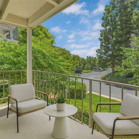 a view of a two chairs in the deck