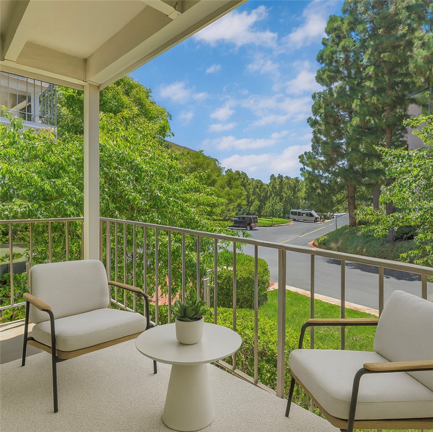 200 McNeil Lane, Unit 204 Newport Beach, CA 92663 - Photo 8 of 28 a view of a two chairs in the deck
