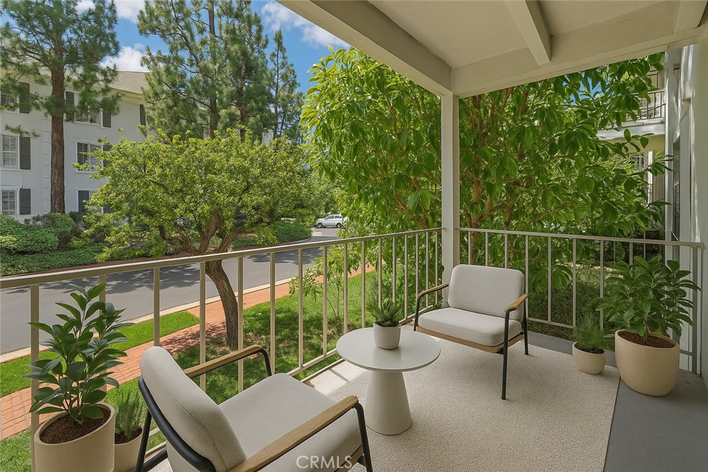 200 McNeil Lane, Unit 204 Newport Beach, CA 92663 - Photo 9 of 28 a view of a chair and table in the balcony