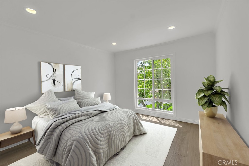 200 McNeil Lane, Unit 204 Newport Beach, CA 92663 - Photo 10 of 28 a bedroom with a bed and a window