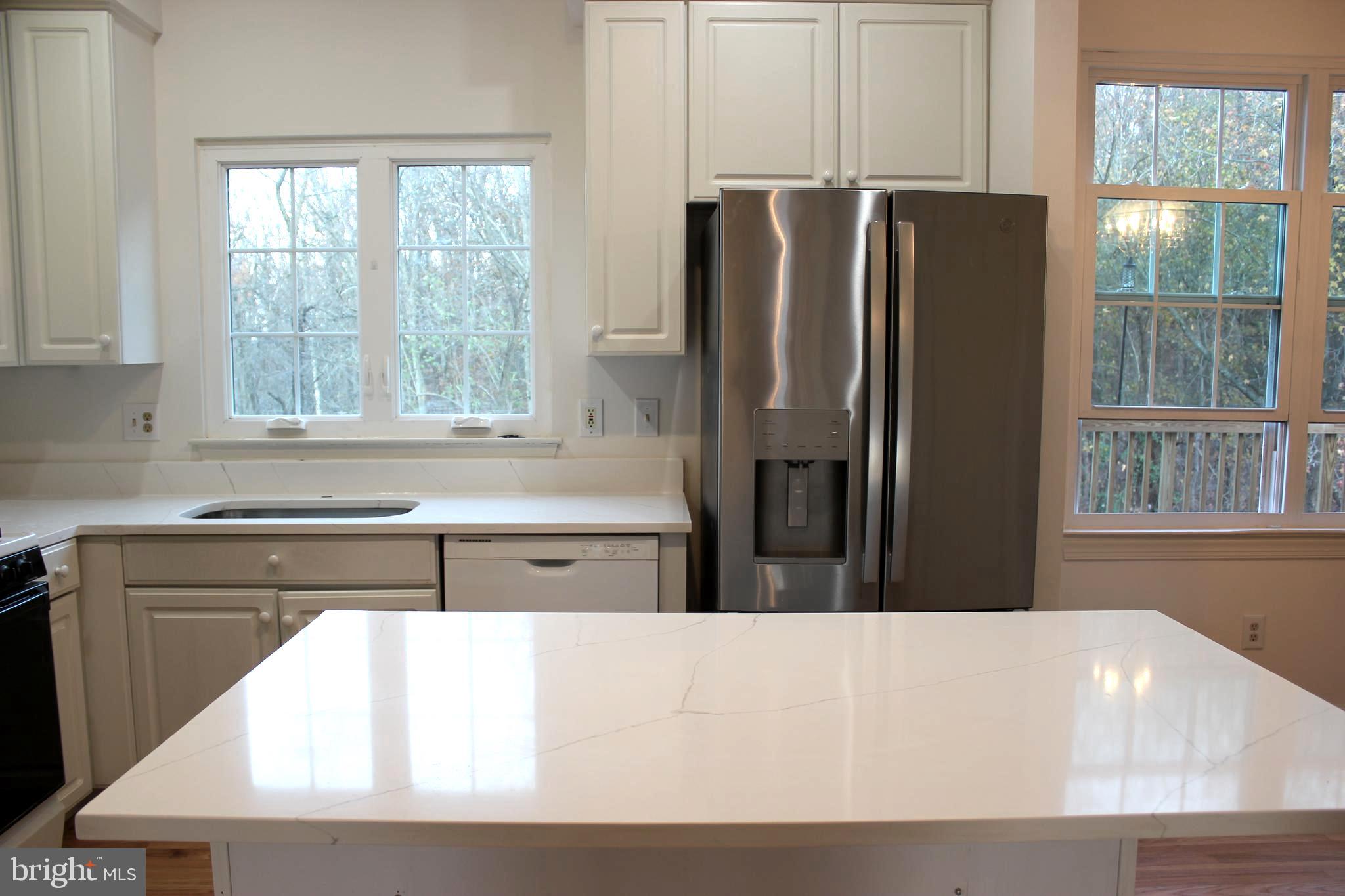 16033 Kings Mountain Road Woodbridge, VA 22191 - Photo 6 of 46 Kitchen island with Quartz Counter top