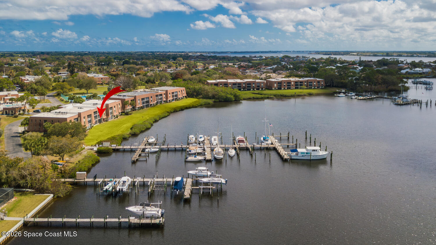 3100 Southeast Pruitt Road, Unit 104 Port St. Lucie, FL 34952 - Photo 1 of 32 an aerial view of a city
