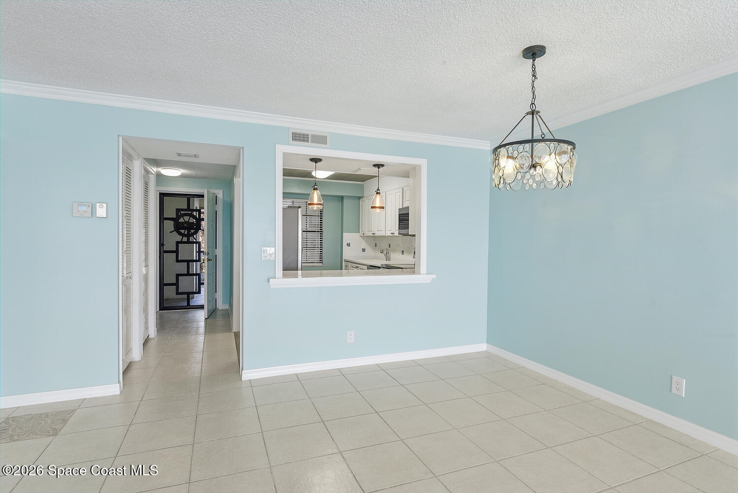 3100 Southeast Pruitt Road, Unit 104 Port St. Lucie, FL 34952 - Photo 11 of 32 a view of an empty room with window and wooden floor
