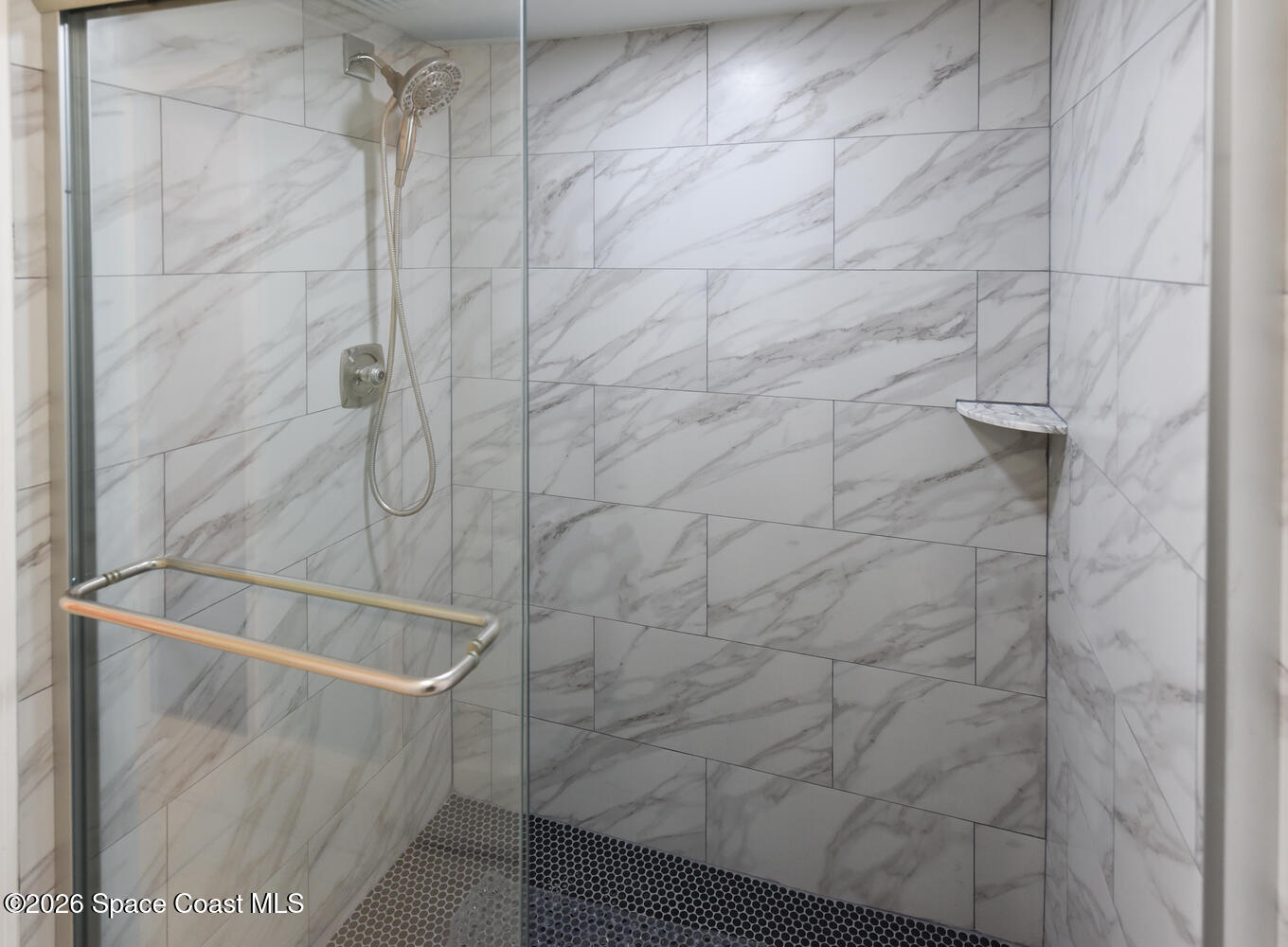 3100 Southeast Pruitt Road, Unit 104 Port St. Lucie, FL 34952 - Photo 19 of 32 a bathroom with a shower