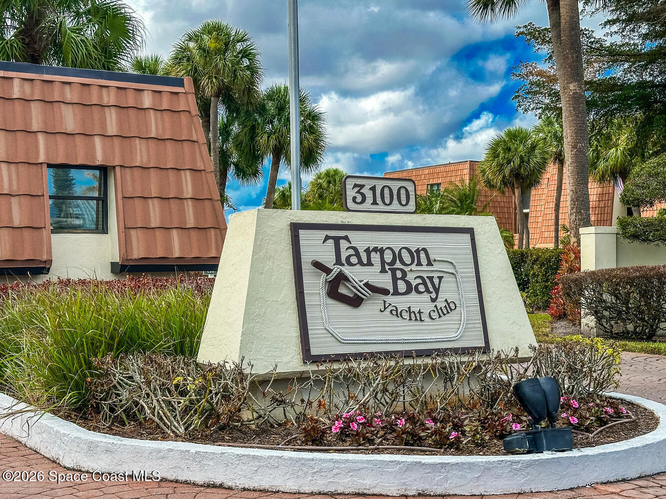 3100 Southeast Pruitt Road, Unit 104 Port St. Lucie, FL 34952 - Photo 26 of 32 a sign on the side of a building