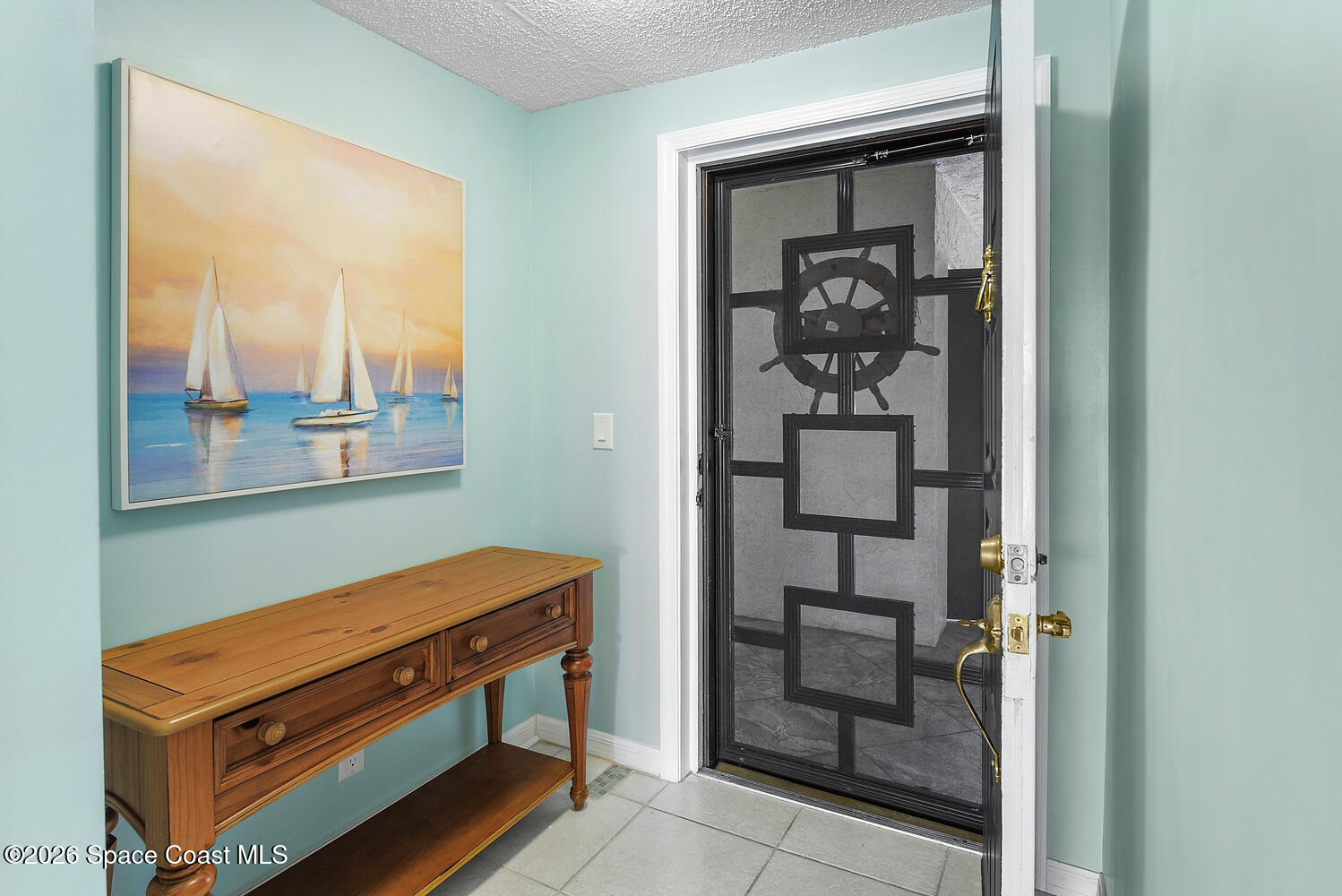 3100 Southeast Pruitt Road, Unit 104 Port St. Lucie, FL 34952 - Photo 7 of 32 a room with furniture and a window