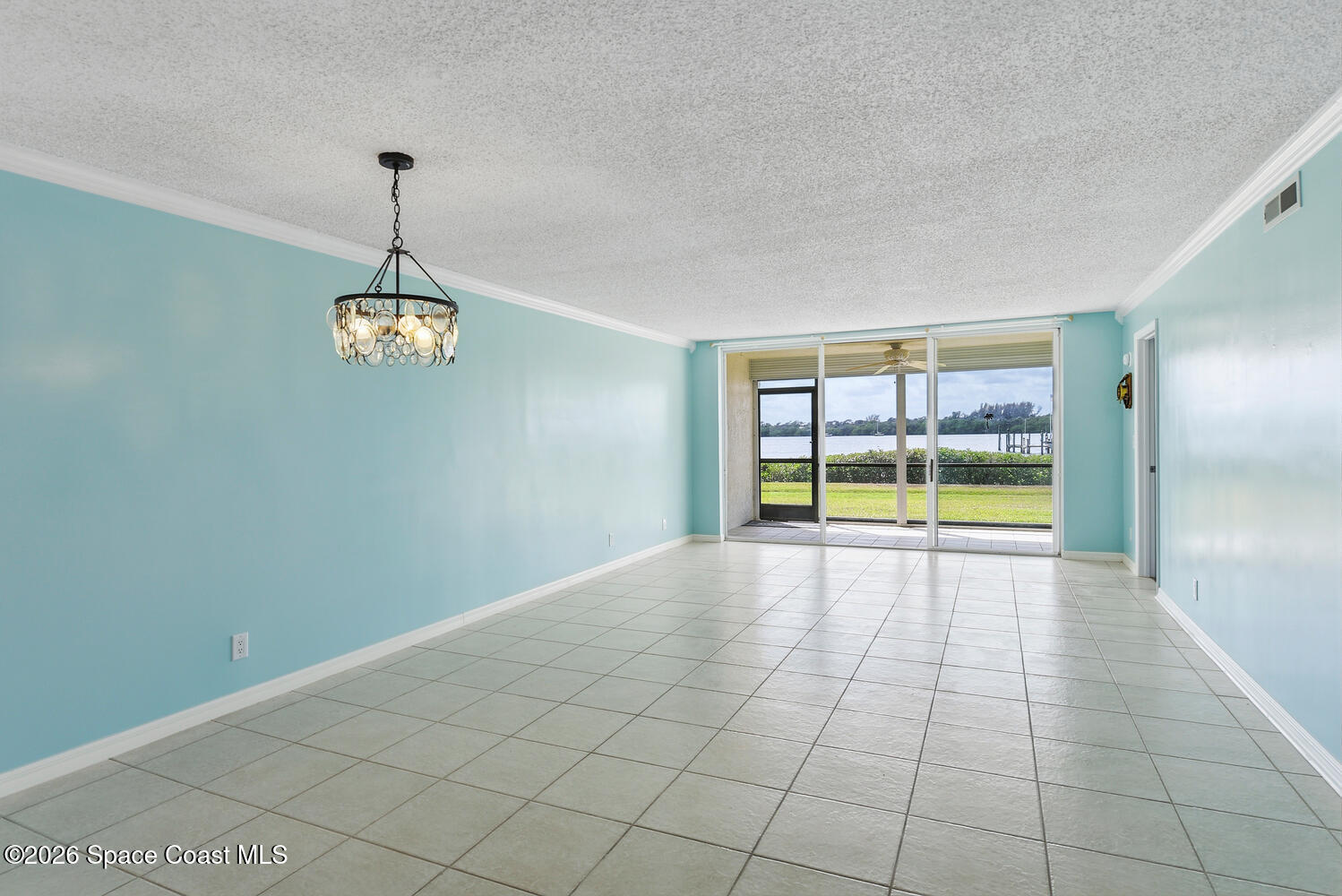 3100 Southeast Pruitt Road, Unit 104 Port St. Lucie, FL 34952 - Photo 8 of 32 a view of an empty room with a window