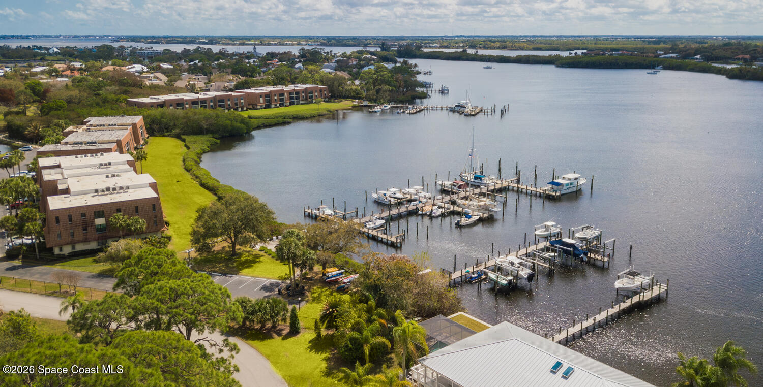 3100 Southeast Pruitt Road, Unit 104 Port St. Lucie, FL 34952 - Photo 10 of 32 an aerial view of a house with a lake view