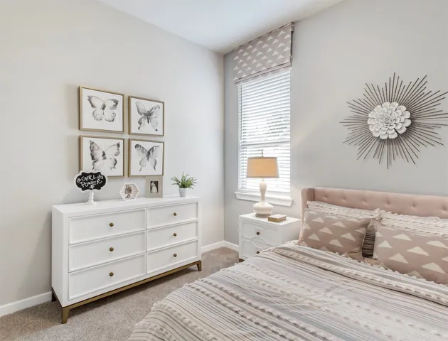 a view of a room with lots of gym equipment