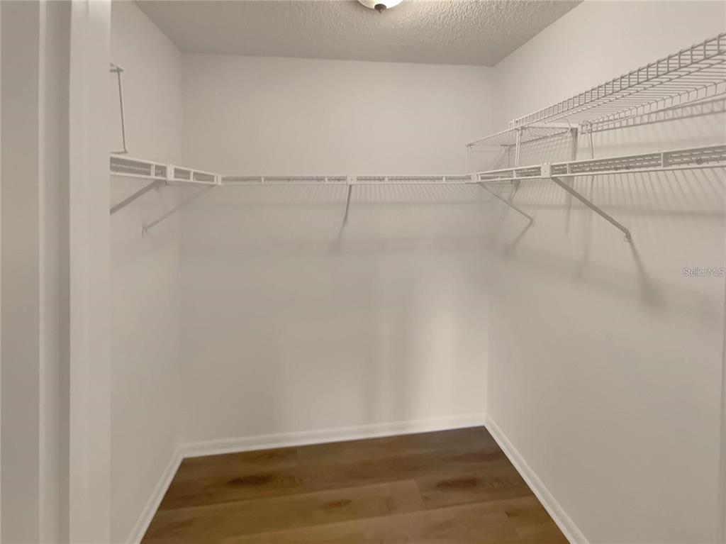 1003 Hammock Pine Boulevard, Unit 1003 Clearwater, FL 33761 - Photo 17 of 28 a view of a room with racks on the wall