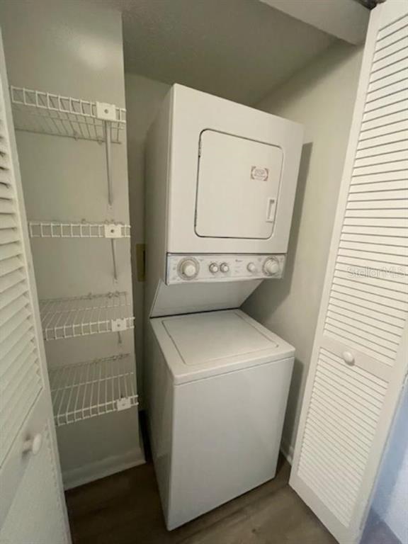 1003 Hammock Pine Boulevard, Unit 1003 Clearwater, FL 33761 - Photo 18 of 28 a utility room with dryer and washer
