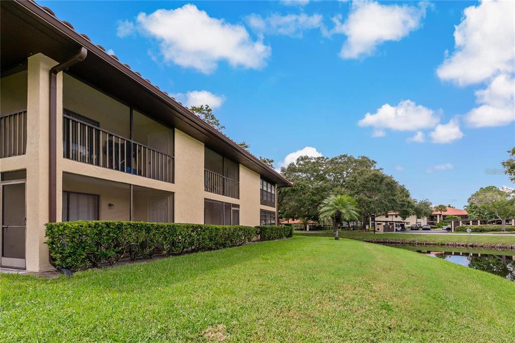 1003 Hammock Pine Boulevard, Unit 1003 Clearwater, FL 33761 - Photo 26 of 28 a house view with garden space