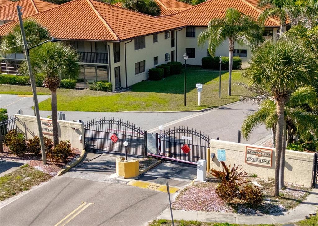 1003 Hammock Pine Boulevard, Unit 1003 Clearwater, FL 33761 - Photo 27 of 28 a view of a house with garden