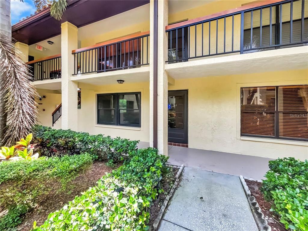 1003 Hammock Pine Boulevard, Unit 1003 Clearwater, FL 33761 - Photo 4 of 28 front view of a house