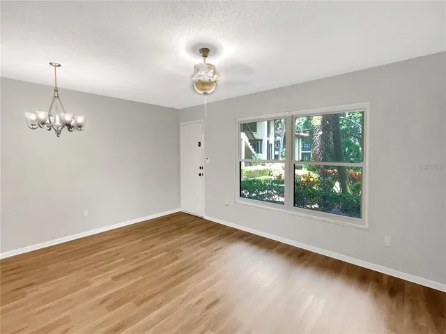 a view of livingroom with hardwood floor and window