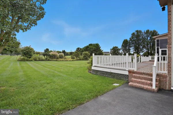a view of a house with a big yard