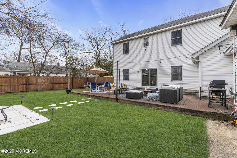 40 Pinehurst Road Brick, NJ 08723 - Photo 46 of 47 a view of a house with a backyard porch and sitting area