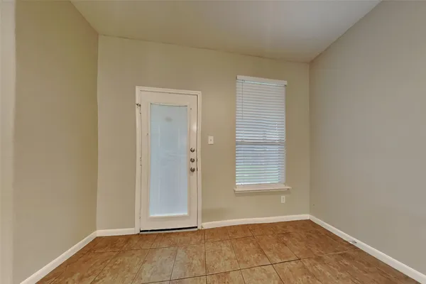 an empty room with window