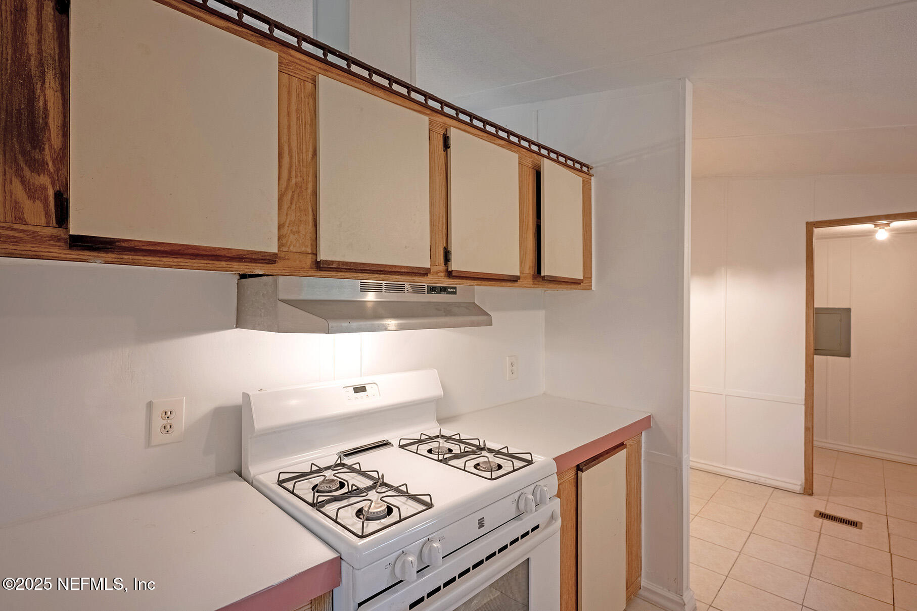 8105 Colee Cove Road St. Augustine, FL 32092 - Photo 18 of 44 a bathroom with a sink and a mirror