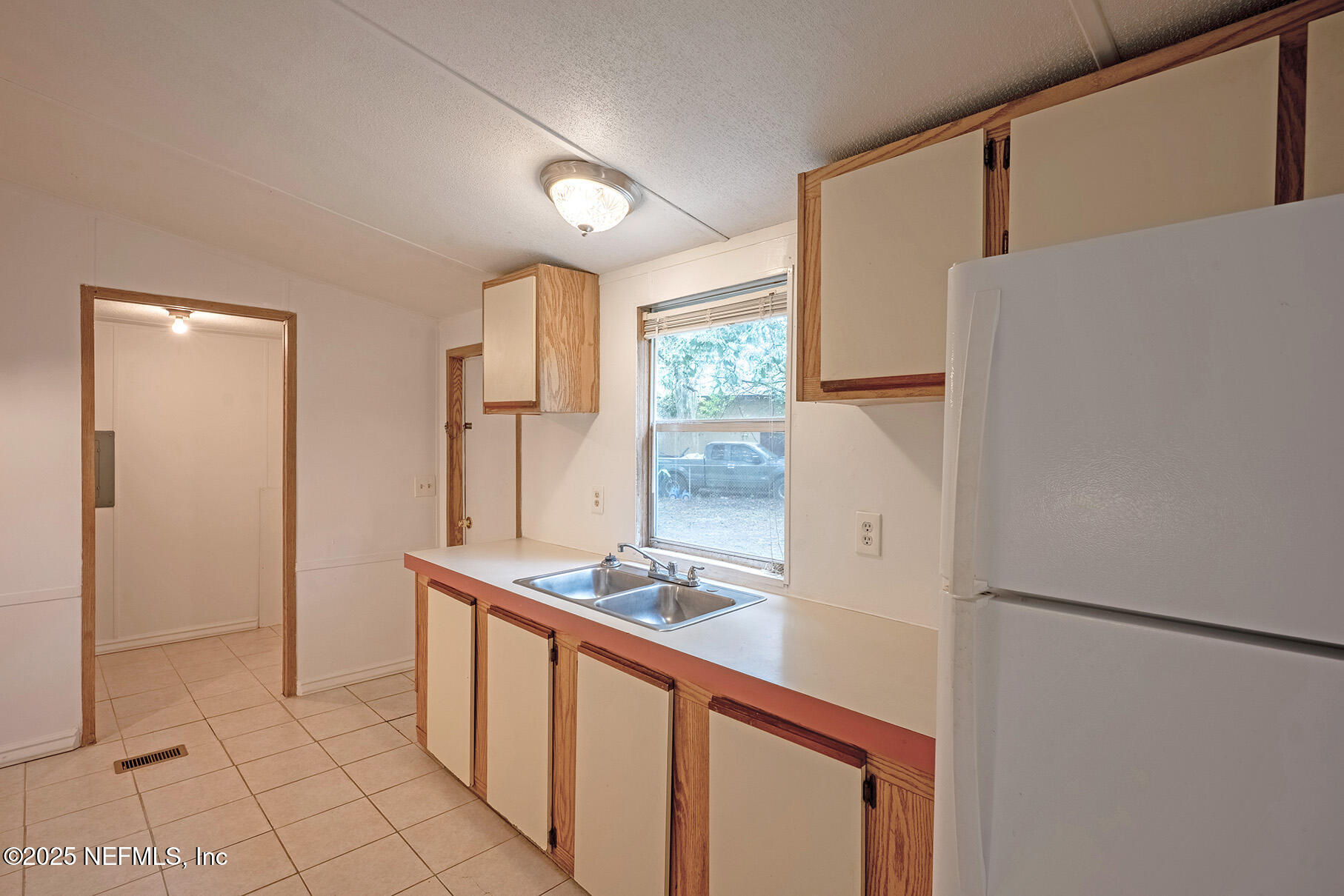 8105 Colee Cove Road St. Augustine, FL 32092 - Photo 19 of 44 a bathroom with a sink and a mirror
