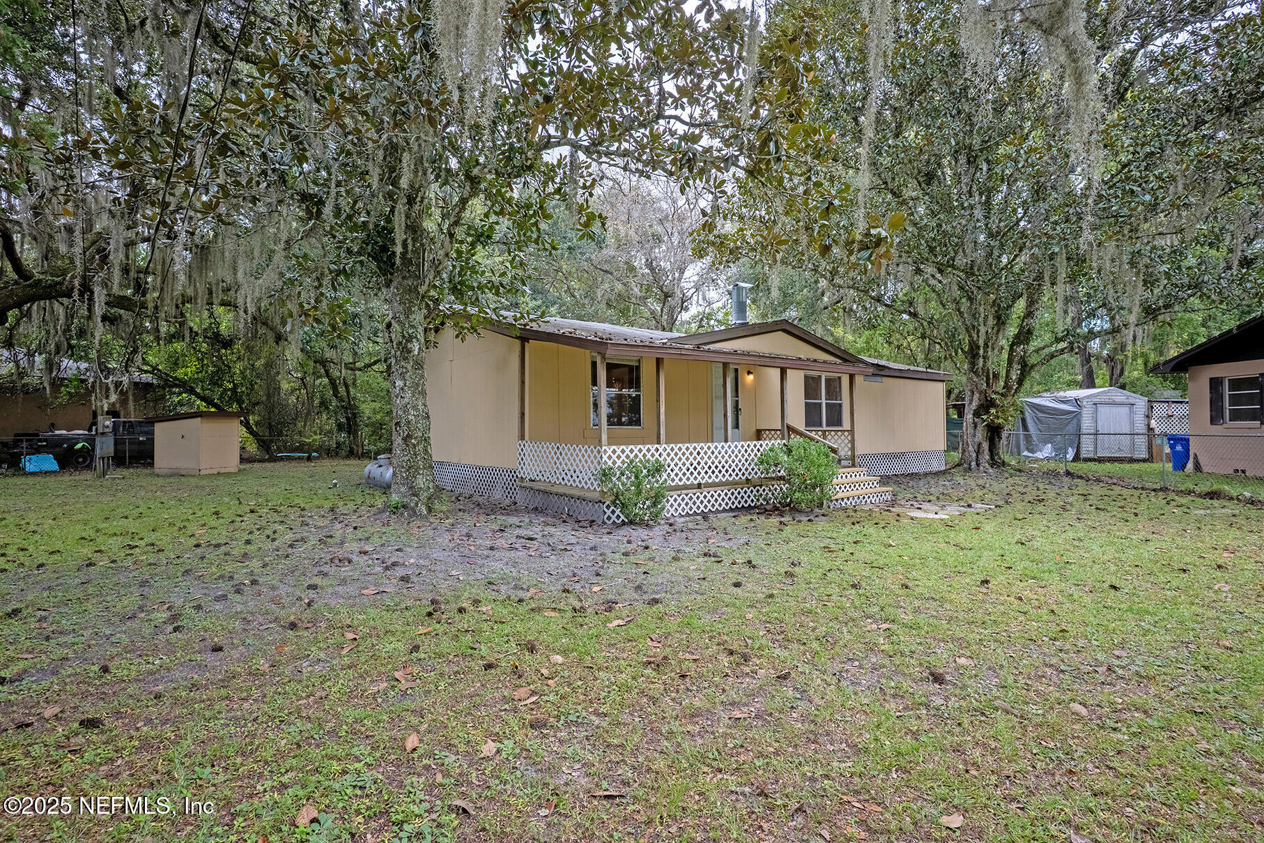 8105 Colee Cove Road St. Augustine, FL 32092 - Photo 2 of 44 a view of a house with a yard