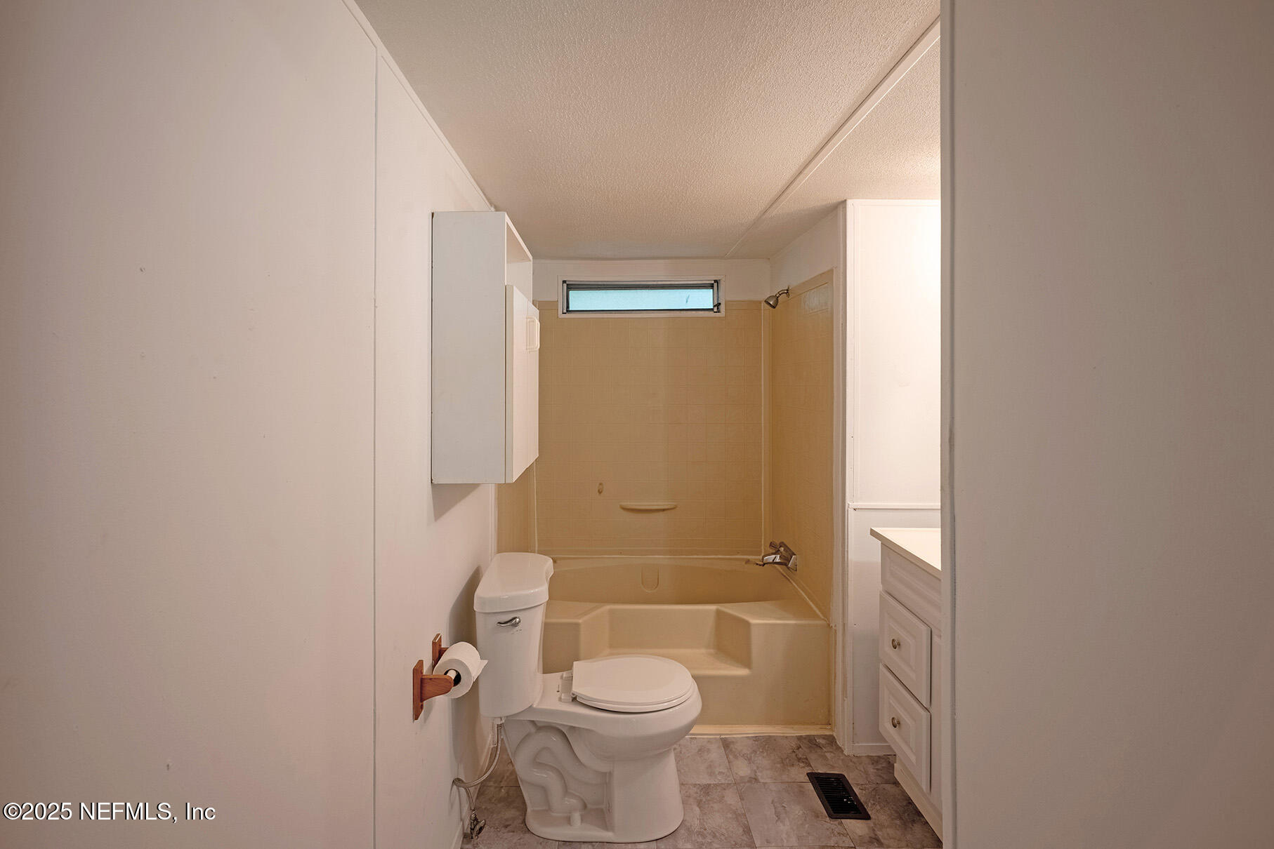 8105 Colee Cove Road St. Augustine, FL 32092 - Photo 31 of 44 a bathroom with a toilet and a shower