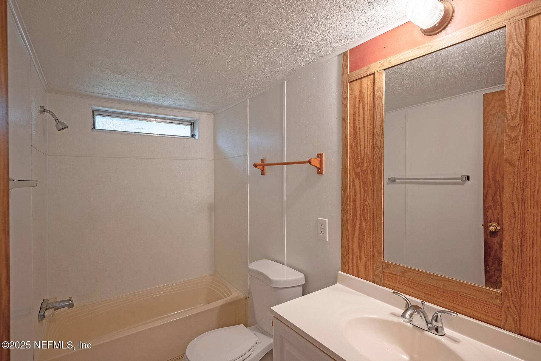 8105 Colee Cove Road St. Augustine, FL 32092 - Photo 37 of 44 a bathroom with a sink a toilet and shower