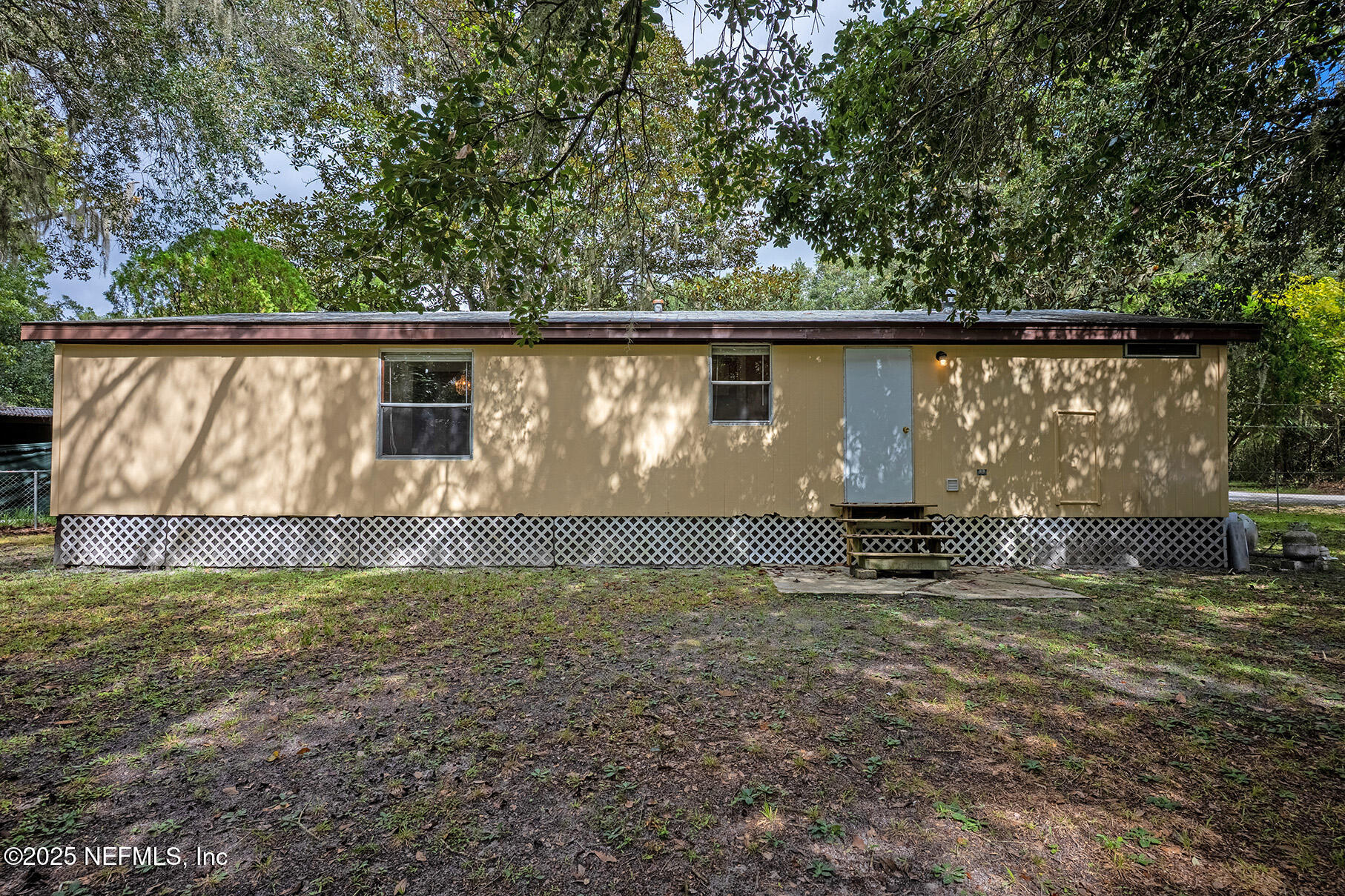 8105 Colee Cove Road St. Augustine, FL 32092 - Photo 39 of 44 a view of a backyard
