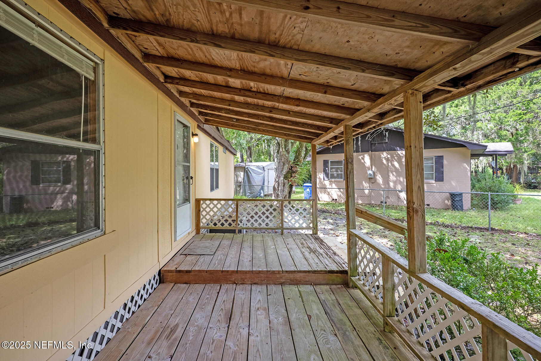 8105 Colee Cove Road St. Augustine, FL 32092 - Photo 4 of 44 a view of porch with wooden floor