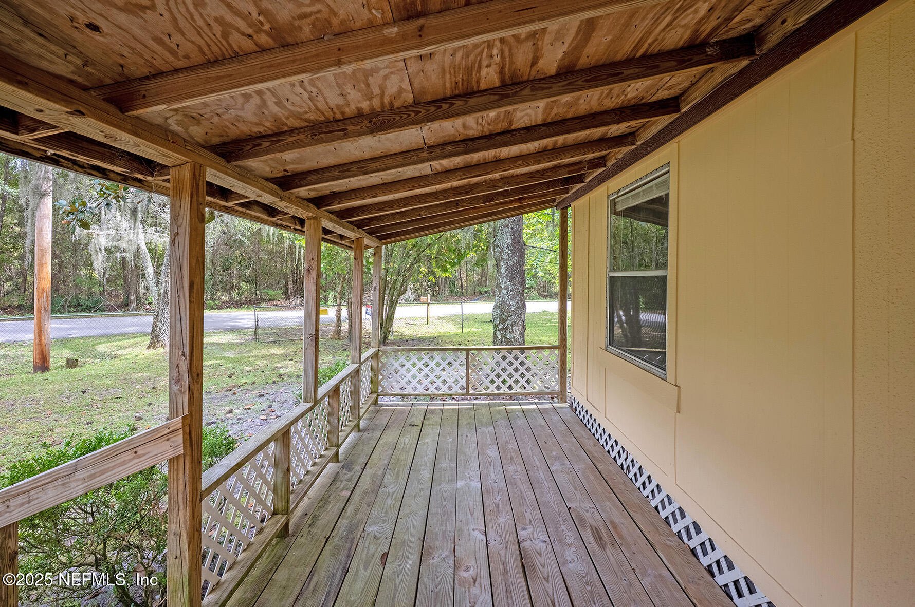 8105 Colee Cove Road St. Augustine, FL 32092 - Photo 5 of 44 a view of porch with wooden floor