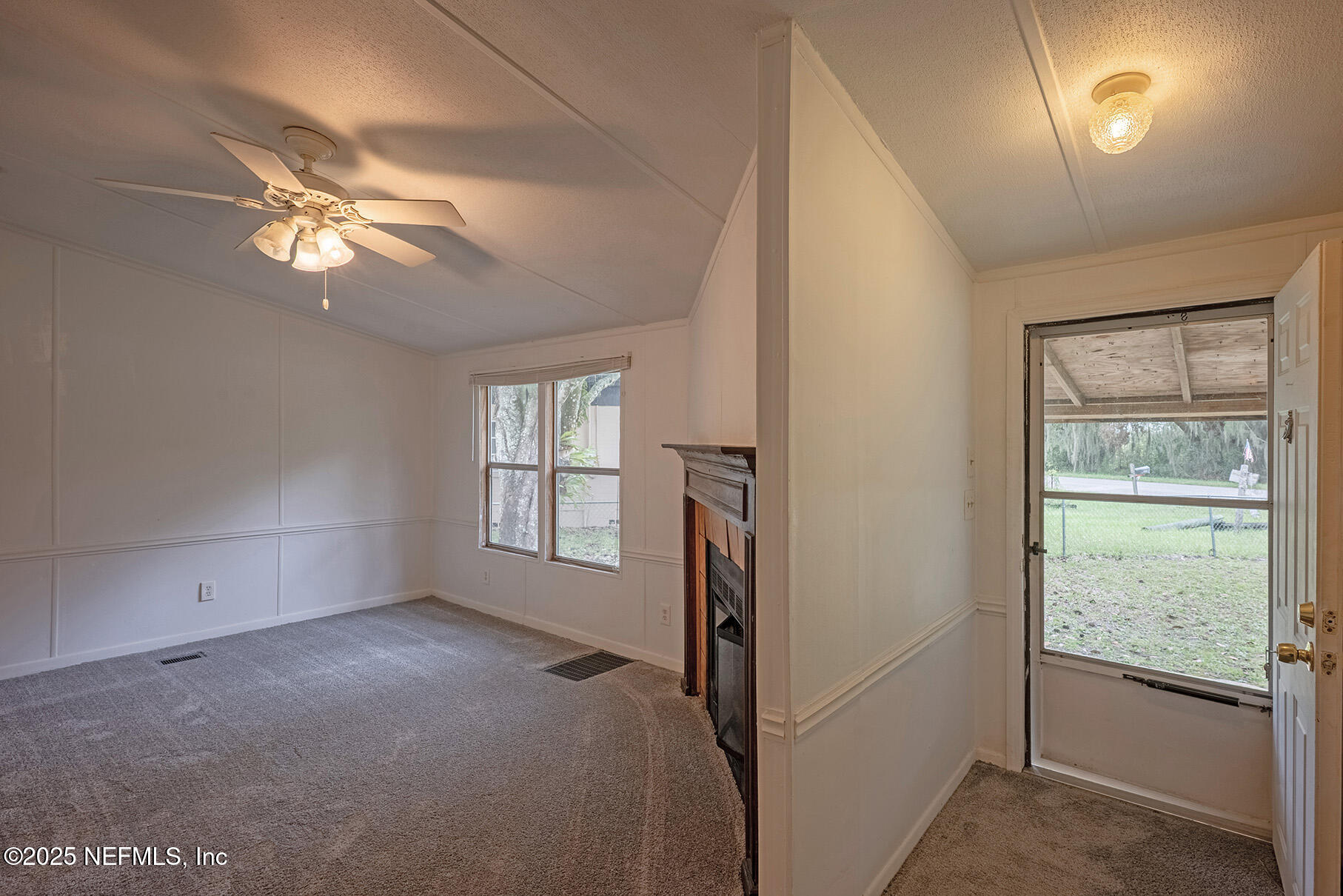 8105 Colee Cove Road St. Augustine, FL 32092 - Photo 7 of 44 a view of room with window and ceiling fan