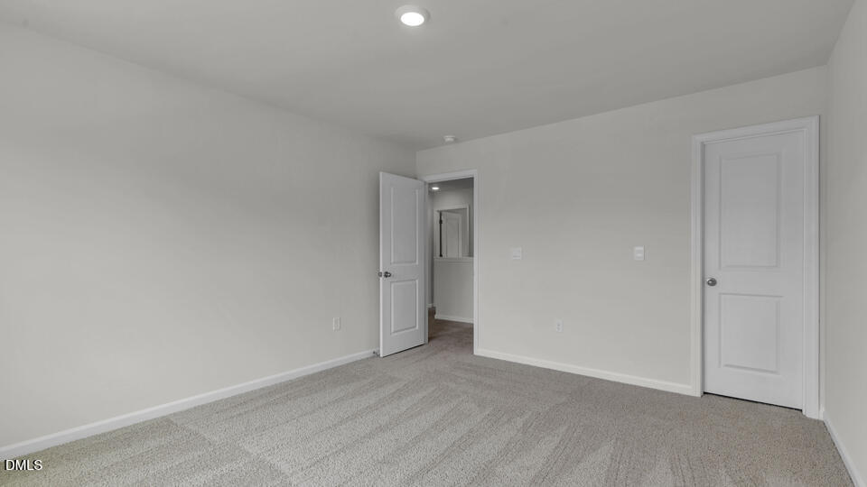 1316 Pavo Path Wendell, NC 27591 - Photo 28 of 54 a view of an empty room and closet area