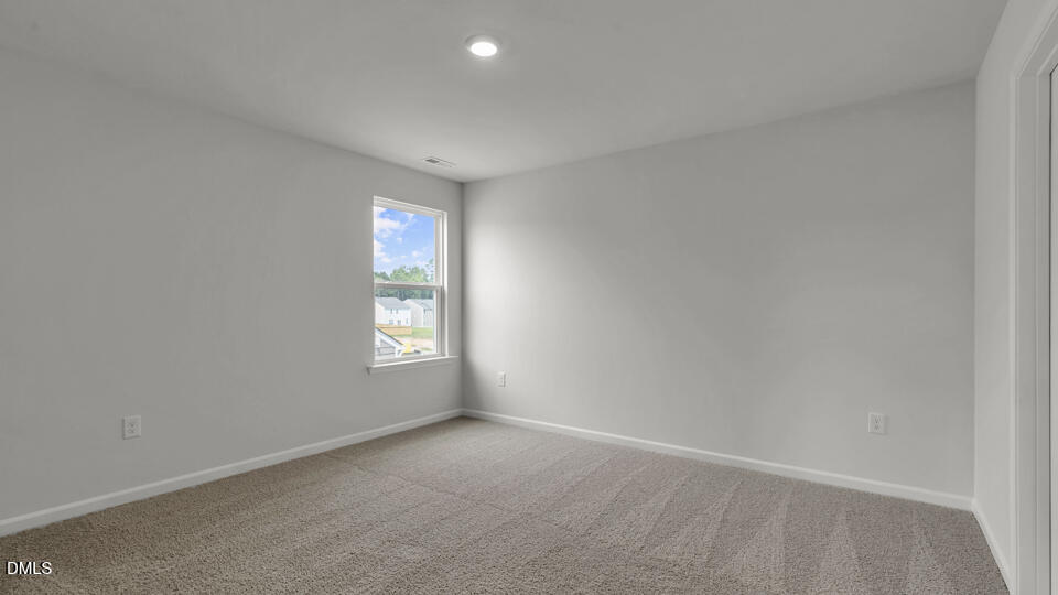 1316 Pavo Path Wendell, NC 27591 - Photo 29 of 54 a view of an empty room and window