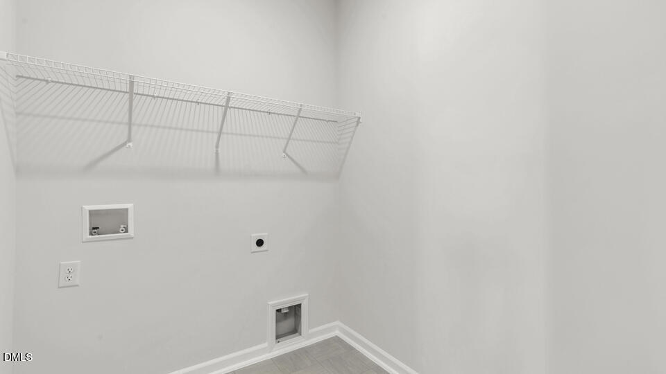 1316 Pavo Path Wendell, NC 27591 - Photo 34 of 54 a view of a room with racks on the wall