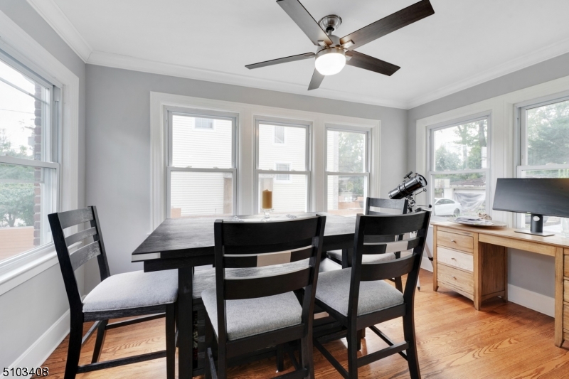 759 Ridgewood Road Millburn, NJ 07041 - Photo 7 of 16 a view of a dining room with a table and chairs