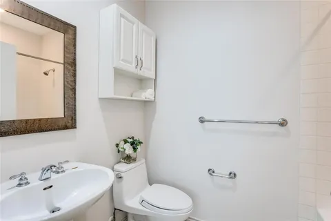 a bathroom with a sink and mirror