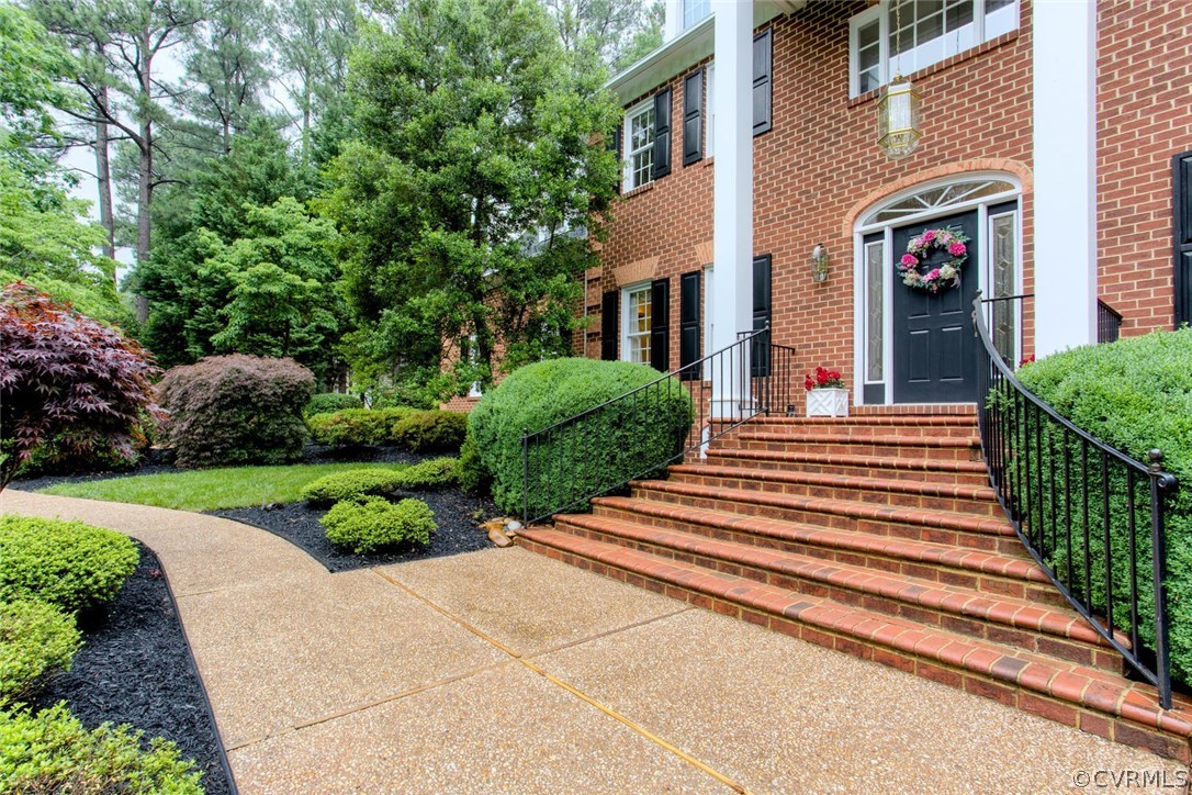 5803 Fox Briar Road Midlothian, VA 23112 - Photo 4 of 50 a view of a house with stairs and a yard
