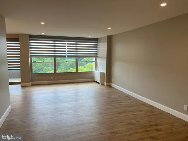 a bathroom with a toilet a sink and a shower