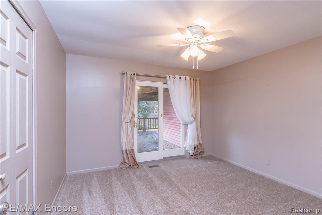 5393 Copley Square Road Grand Blanc, MI 48439 - Photo 12 of 22 Bedroom w. doorwall leading to backyard