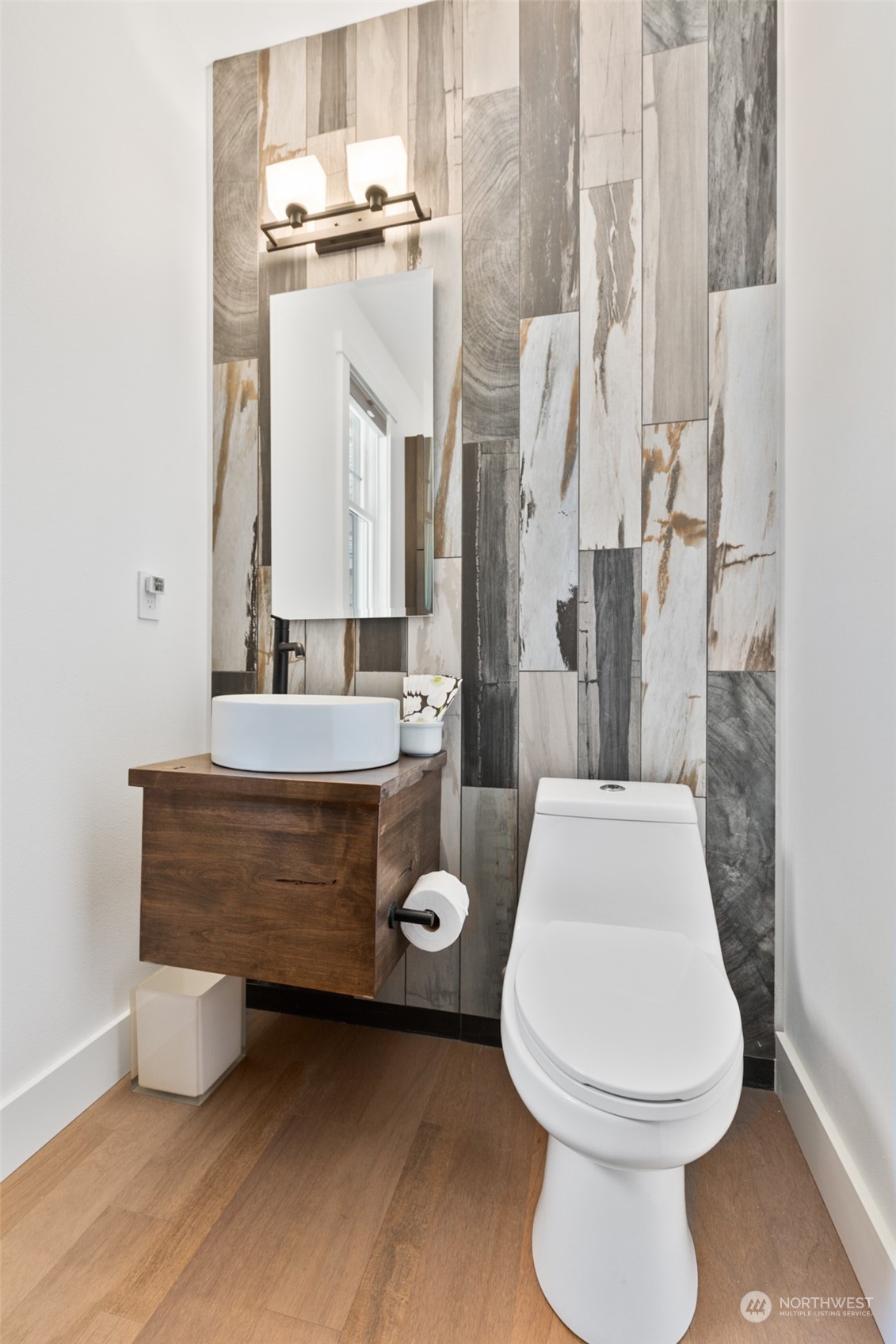 677 Larkspur Loop Cle Elum, WA 98922 - Photo 20 of 38 a bathroom with a toilet a sink and a mirror