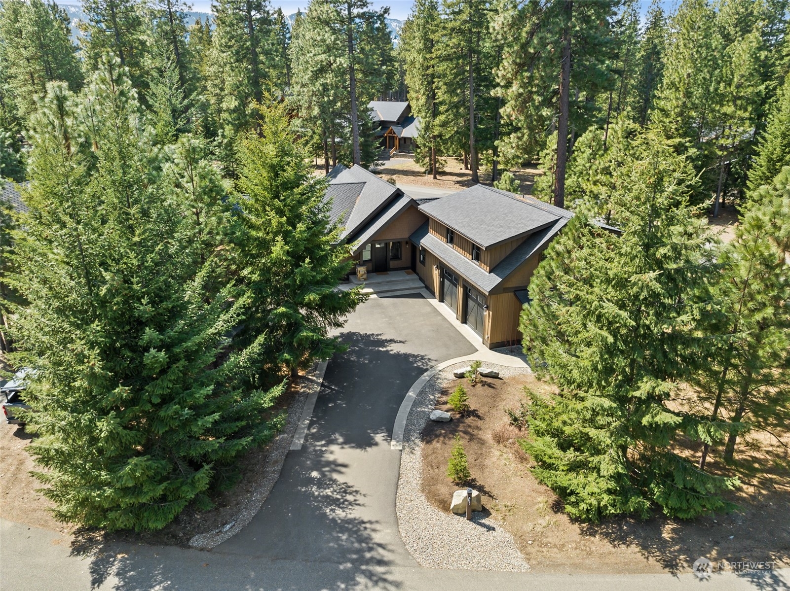 677 Larkspur Loop Cle Elum, WA 98922 - Photo 33 of 38 an aerial view of a house with a yard basket ball court and outdoor seating