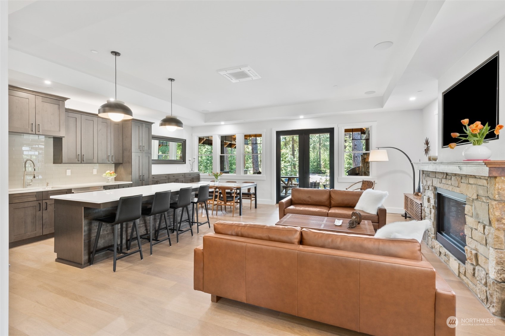 677 Larkspur Loop Cle Elum, WA 98922 - Photo 7 of 38 a living room with fireplace furniture and a flat screen tv