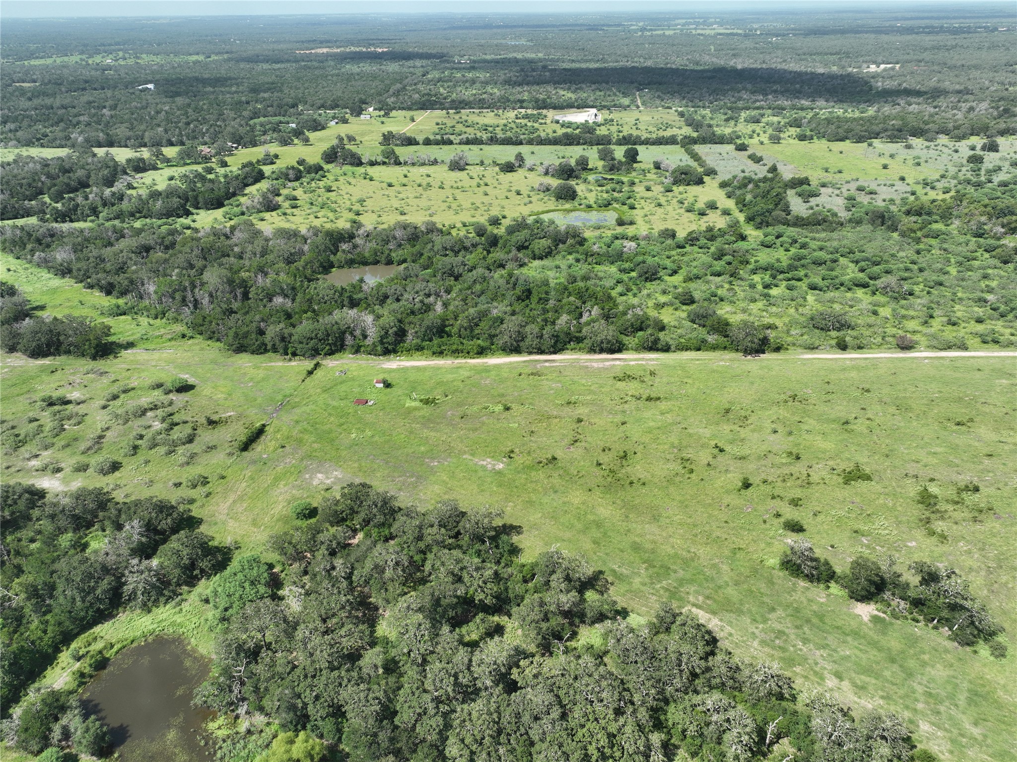 514 Trailer Park Road Carmine, TX 78932 - Photo 17 of 19 a view of a yard with an outdoor space