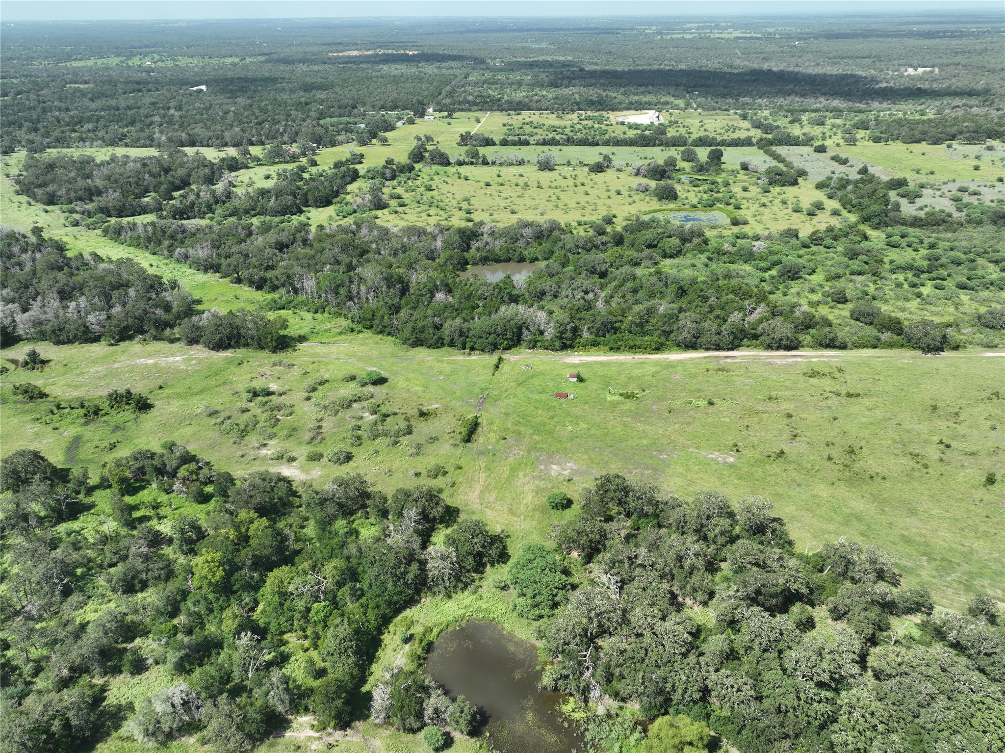 514 Trailer Park Road Carmine, TX 78932 - Photo 18 of 19 a view of a yard with an outdoor space