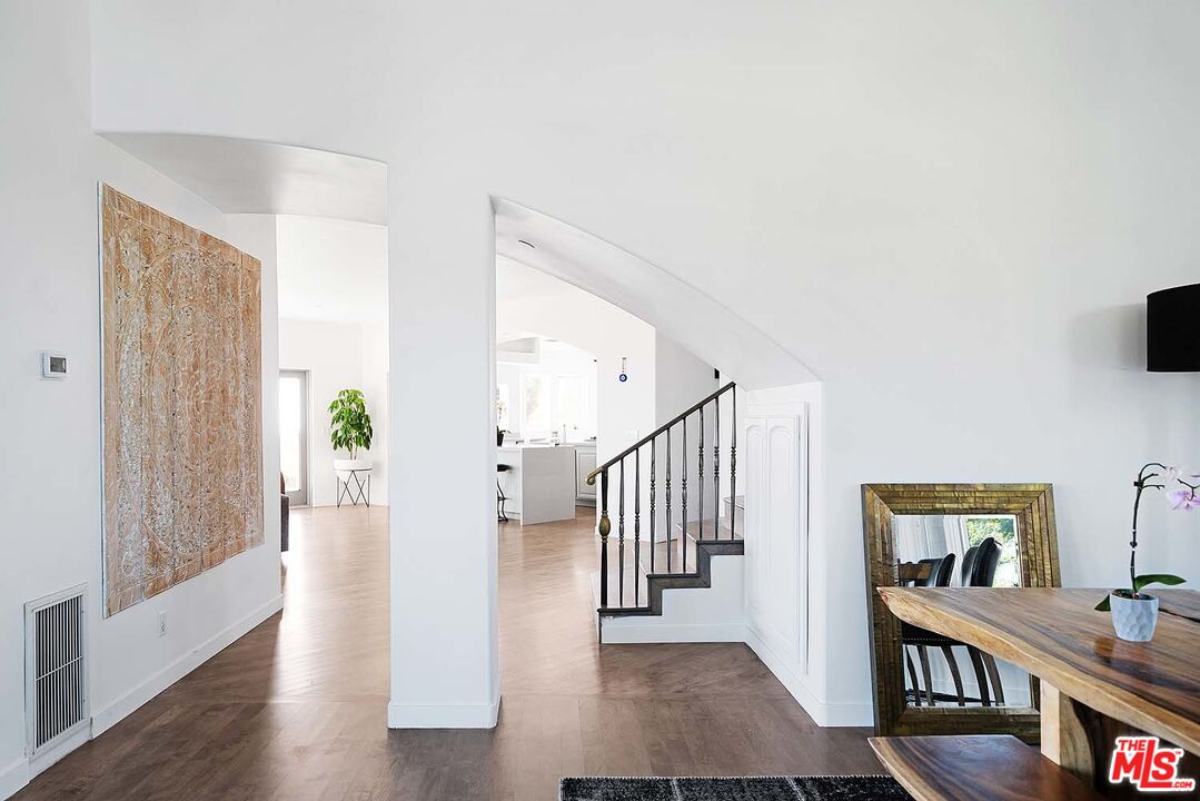 20370 Skyhawk Lane Topanga, CA 90265 - Photo 12 of 43 a view of a hallway with wooden floor and entryway