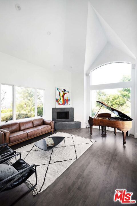 20370 Skyhawk Lane Topanga, CA 90265 - Photo 13 of 43 a living room with furniture and a large window